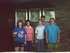 Iola 2nd from Left in Pink Stripe Shirt