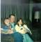 This is my dad, my sister Donna, and I on my mom's 39th birthday.<br>(1981)
