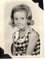 Sandy's third or fourth grade picture from Bixby Elementary School.