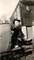 Daughter, Sandy Lu, on the tractor