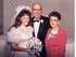 Mary, Dad and Mom at Mary's wedding in August 1991