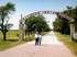 Dad and Lori in front of Chilocco Indian School Entrance where Dad attended school. 1989