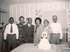Milly with husband Troy and their parents at their wedding in 1948.