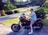 Riding a motorcycle with friends.