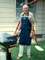Donald cooking hamburgers in the backyard
