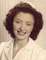 1943, age 18, still smiling.