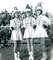 Adrien in the middle of photo (majorette in high school)